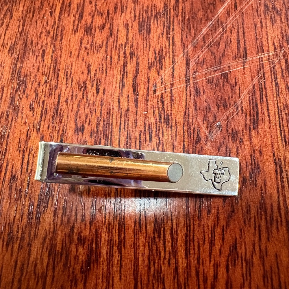 Silver and Gold Tie Clip with Texas Instruments and Bullet Casing
